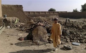 A boy stands at the site of suspected U.S. drone attacks in the Janikhel tribal area in Bannu district of North West Frontier Province in Pakistan, November 19, 2008 Photo: REUTERS (Click on photos for larger images.) 